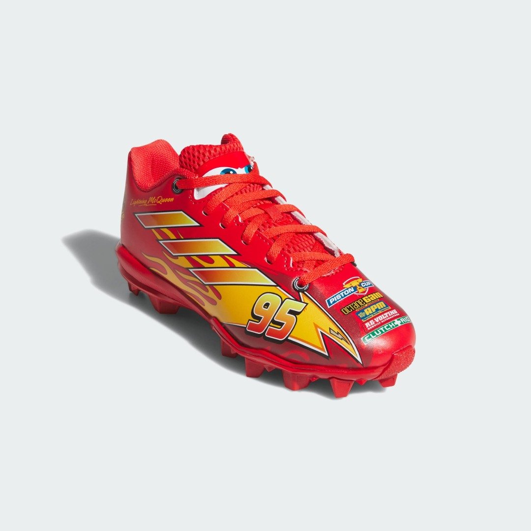 Angled view of the adidas Pixar Cars Adizero Impact 2 kids cleat with #95 and sponsor decals