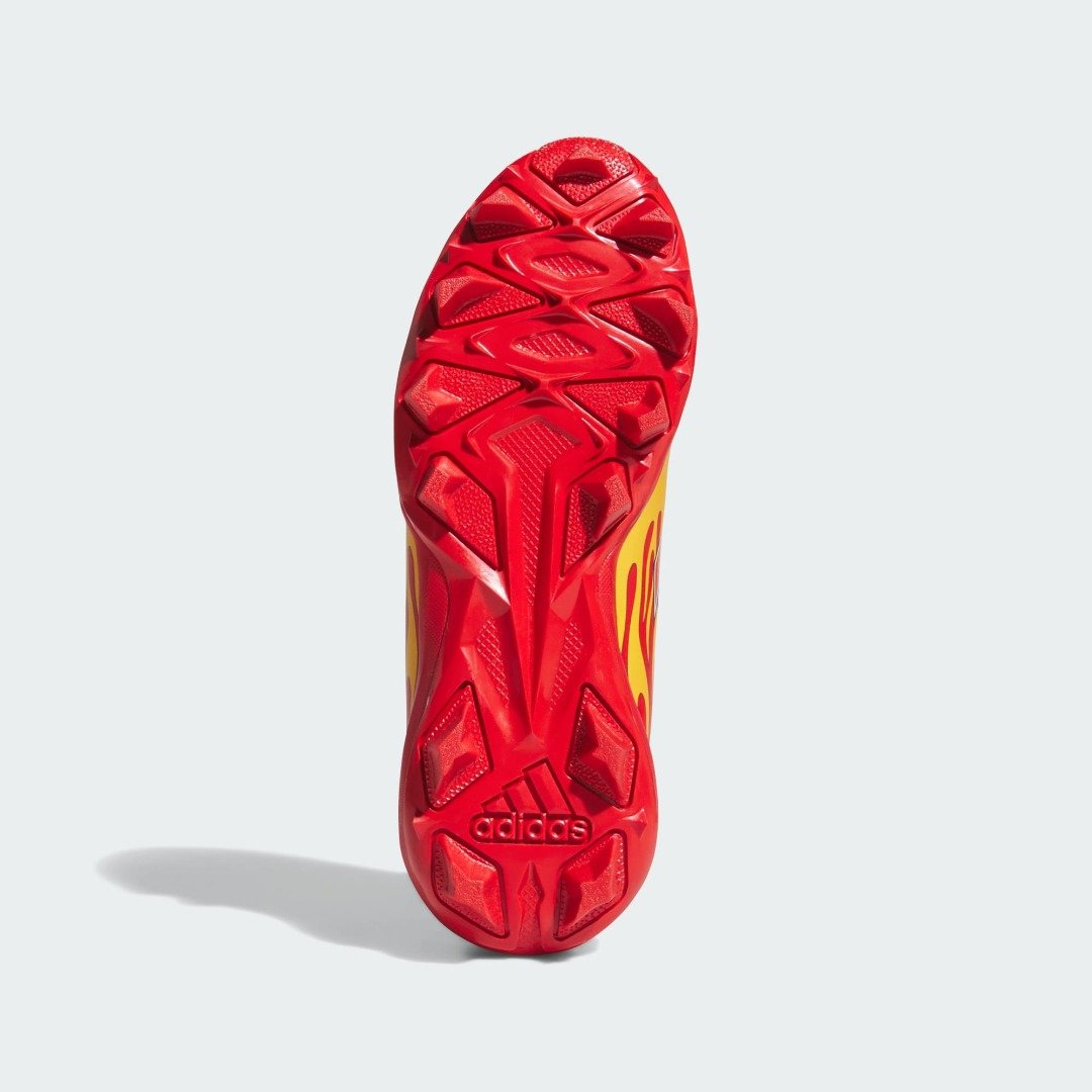 Molded red stud sole of the adidas Pixar Cars Adizero Impact 2 kids baseball cleat