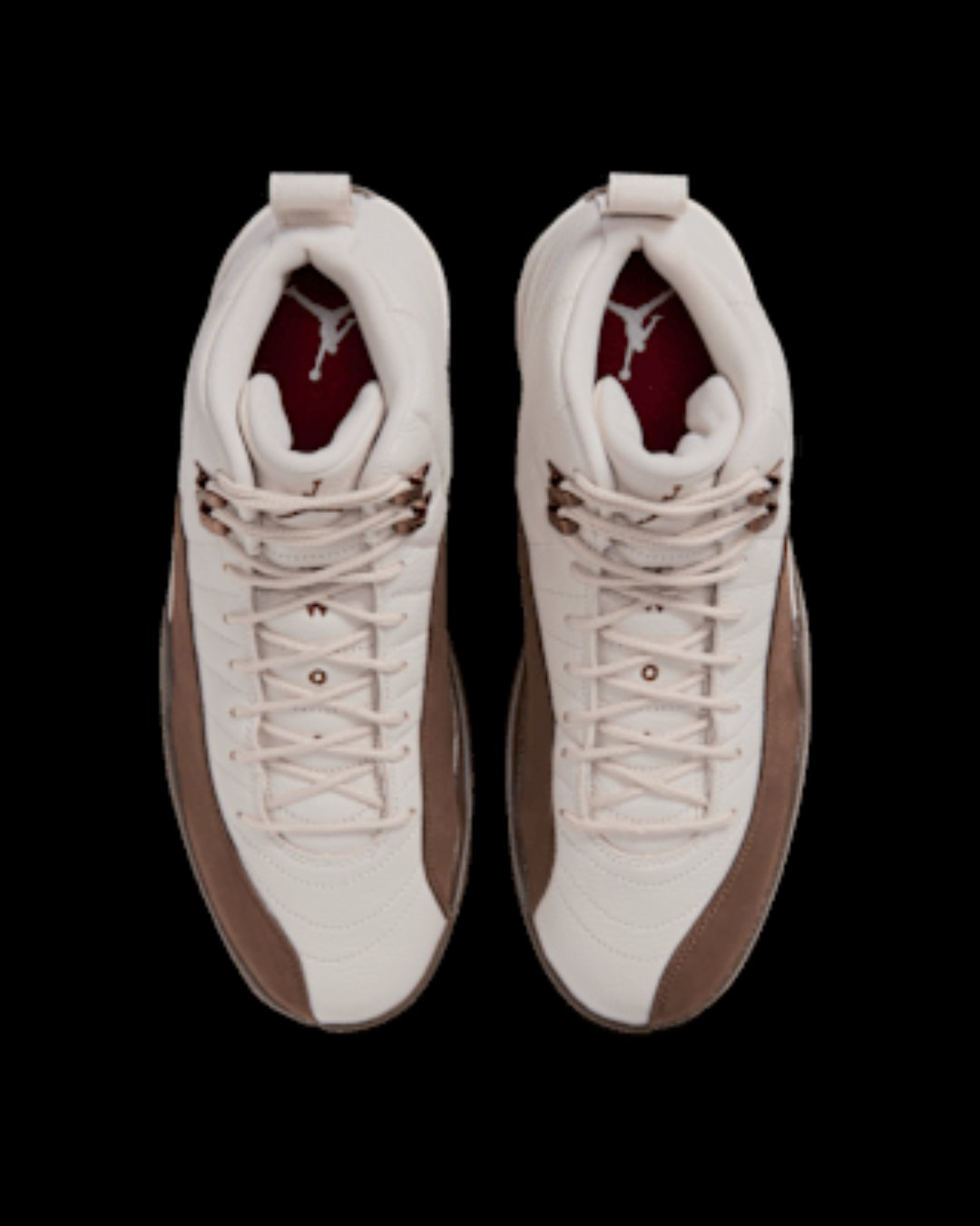 Pair of Air Jordan 12 Retro Fireside top-down showing radial sunrise stitch and copper eyelets