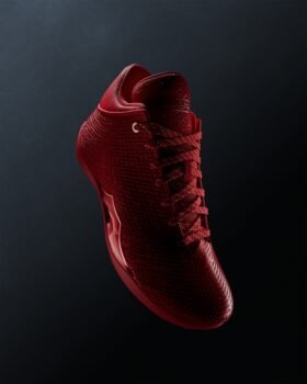 Air Jordan 41 Ruby in University Red and Infrared 23, angled view on a dark background