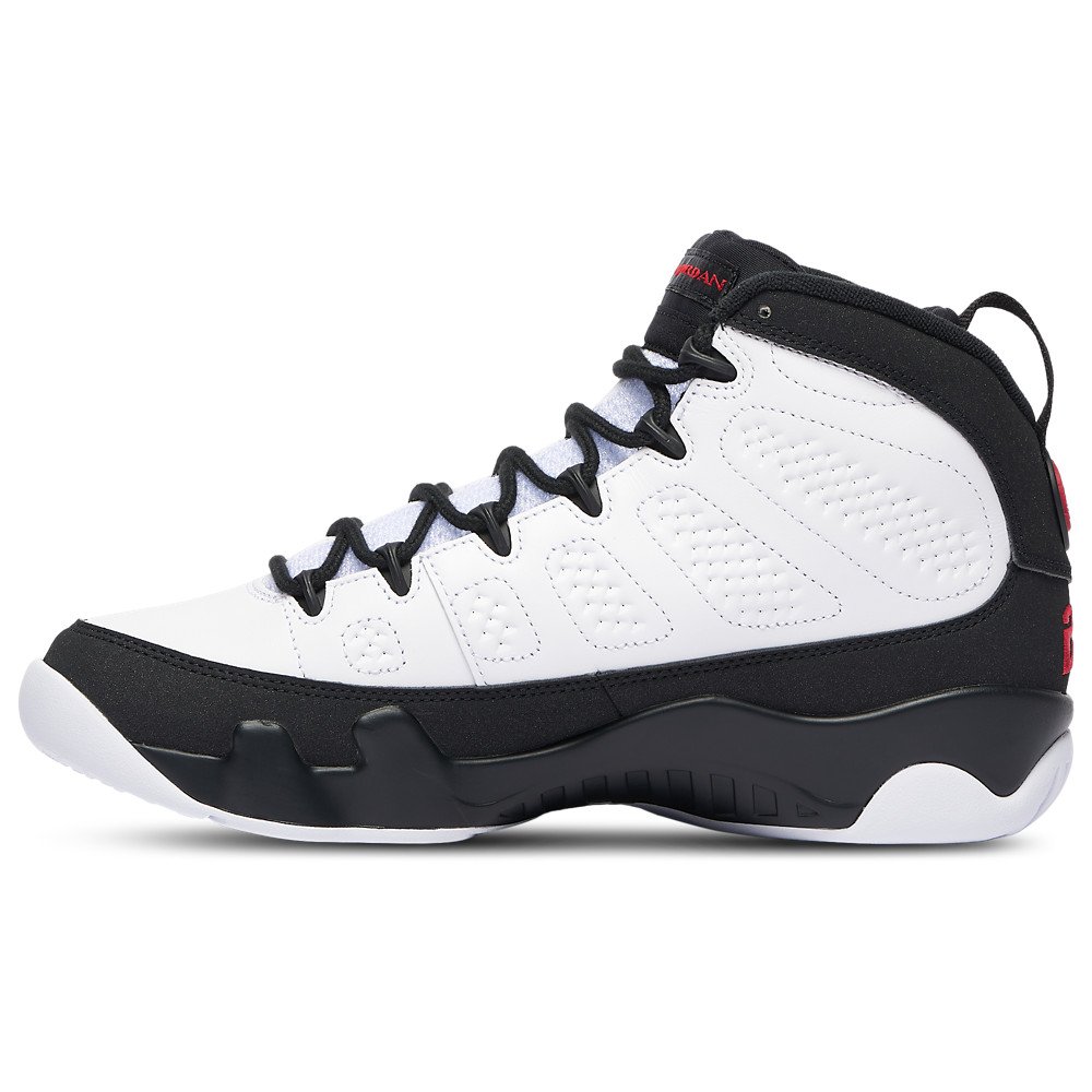 Pair of Air Jordan 9 Space Jam showing the red 23 heel and Jumpman sole