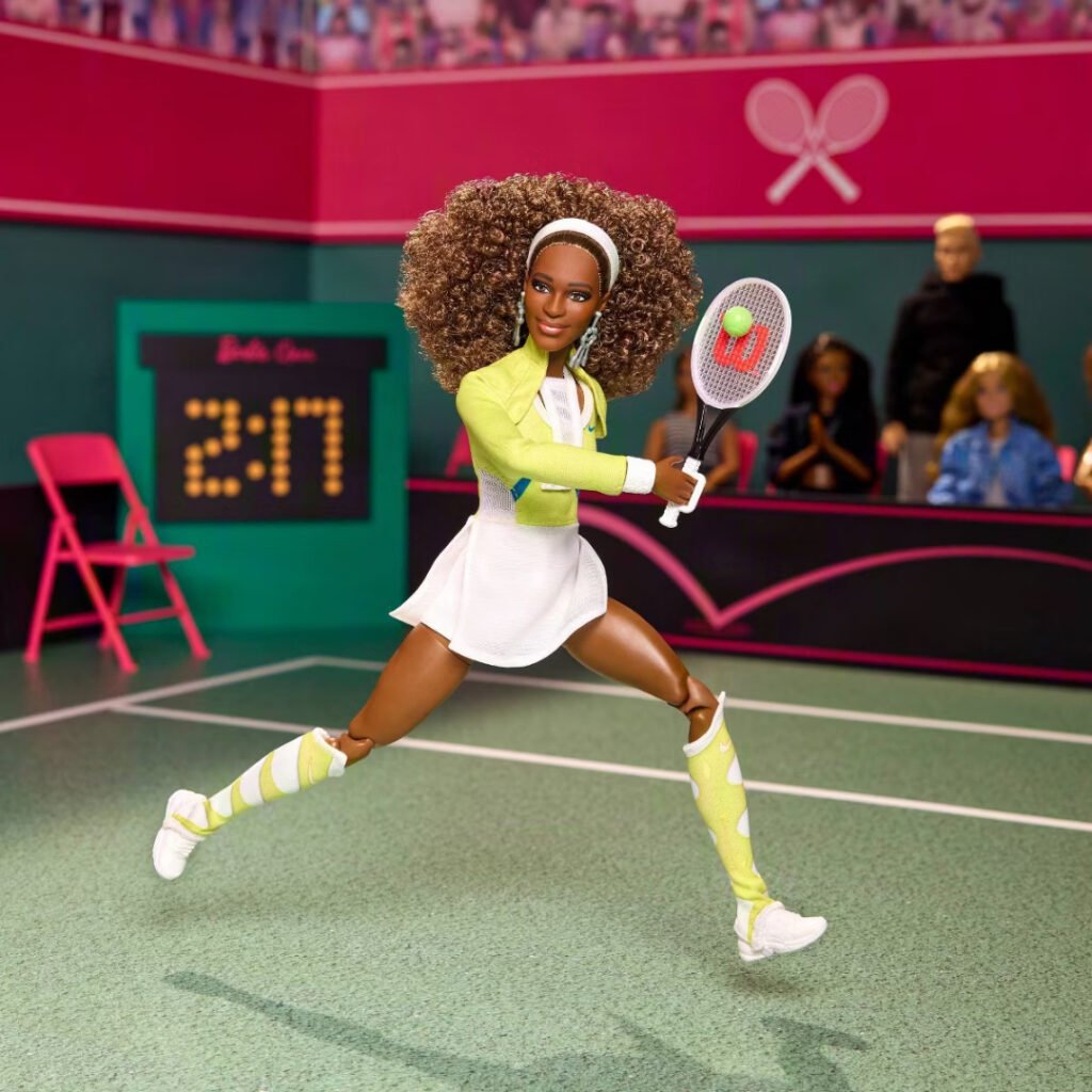 Barbie Signature Serena Williams doll mid-swing on a tennis court