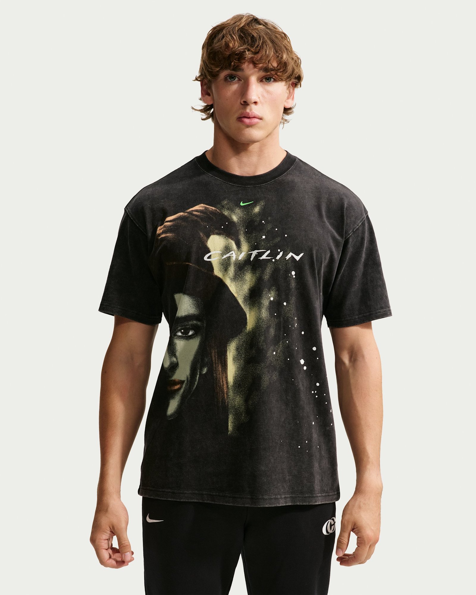 Nike Caitlin Clark Halloween t-shirt in washed black with spooky portrait graphic, front view