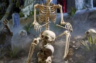 Home Depot 5 ft LED Pose-N-Stay Skeleton with red light-up eyes