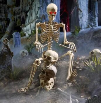 Home Depot 5 ft LED Pose-N-Stay Skeleton with red light-up eyes