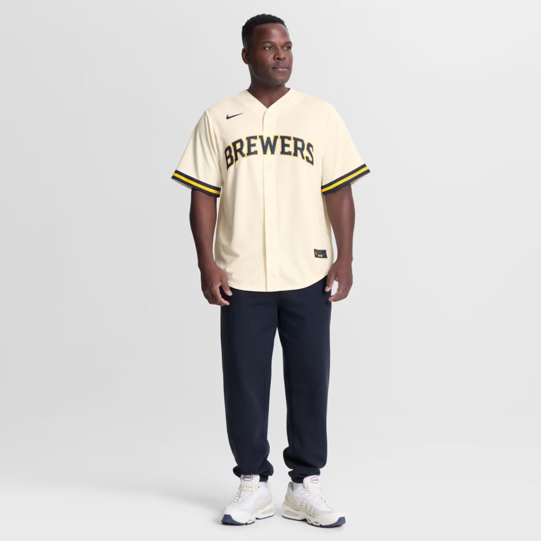 Fan wearing the Chourio Brewers cream home jersey, front