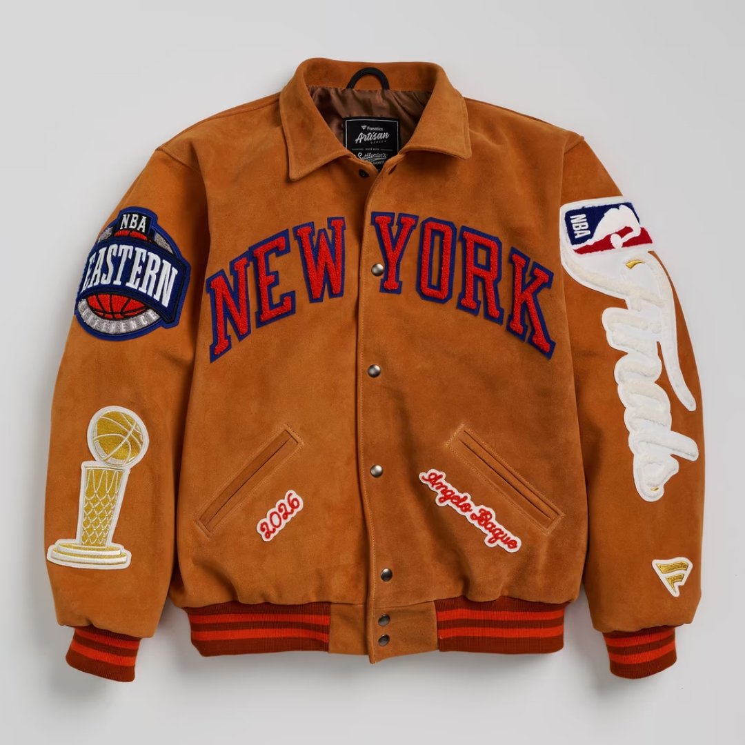 Front of the tan suede Knicks Artisan jacket with NEW YORK chenille lettering and trophy patch
