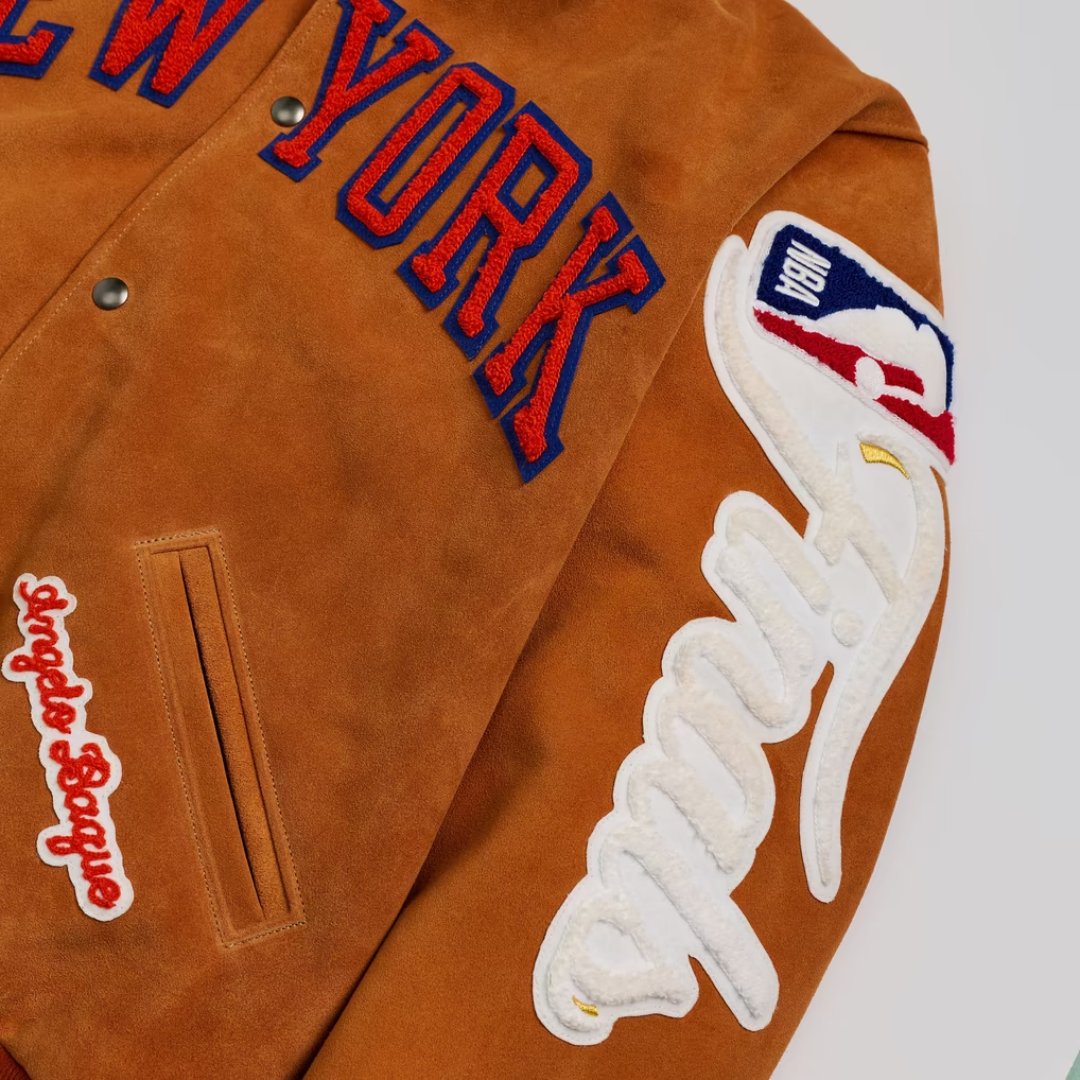 Sleeve of the Knicks Artisan jacket with NBA logo chenille patch