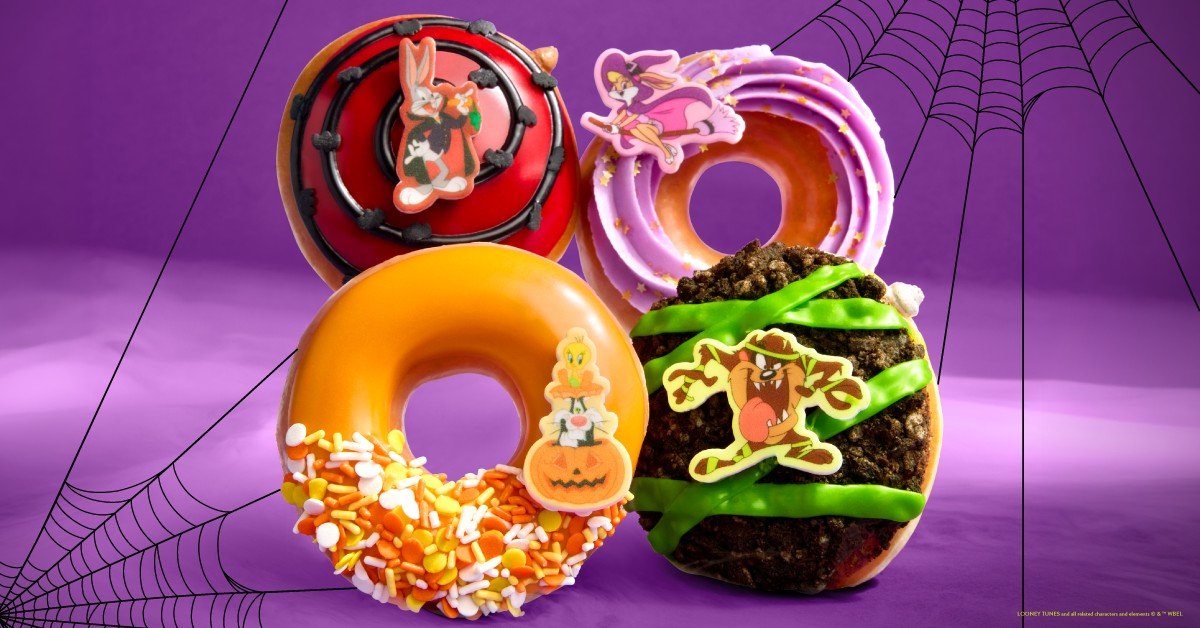 Krispy Kreme Looney Tunes Halloween doughnuts: Bugs Bunny, Lola Bunny, Tweety and Sylvester, and Taz doughnuts on a purple spiderweb background