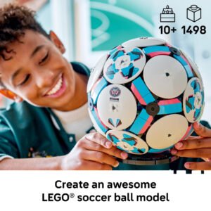 Child building the LEGO soccer ball model, 10+ and 1,498 pieces