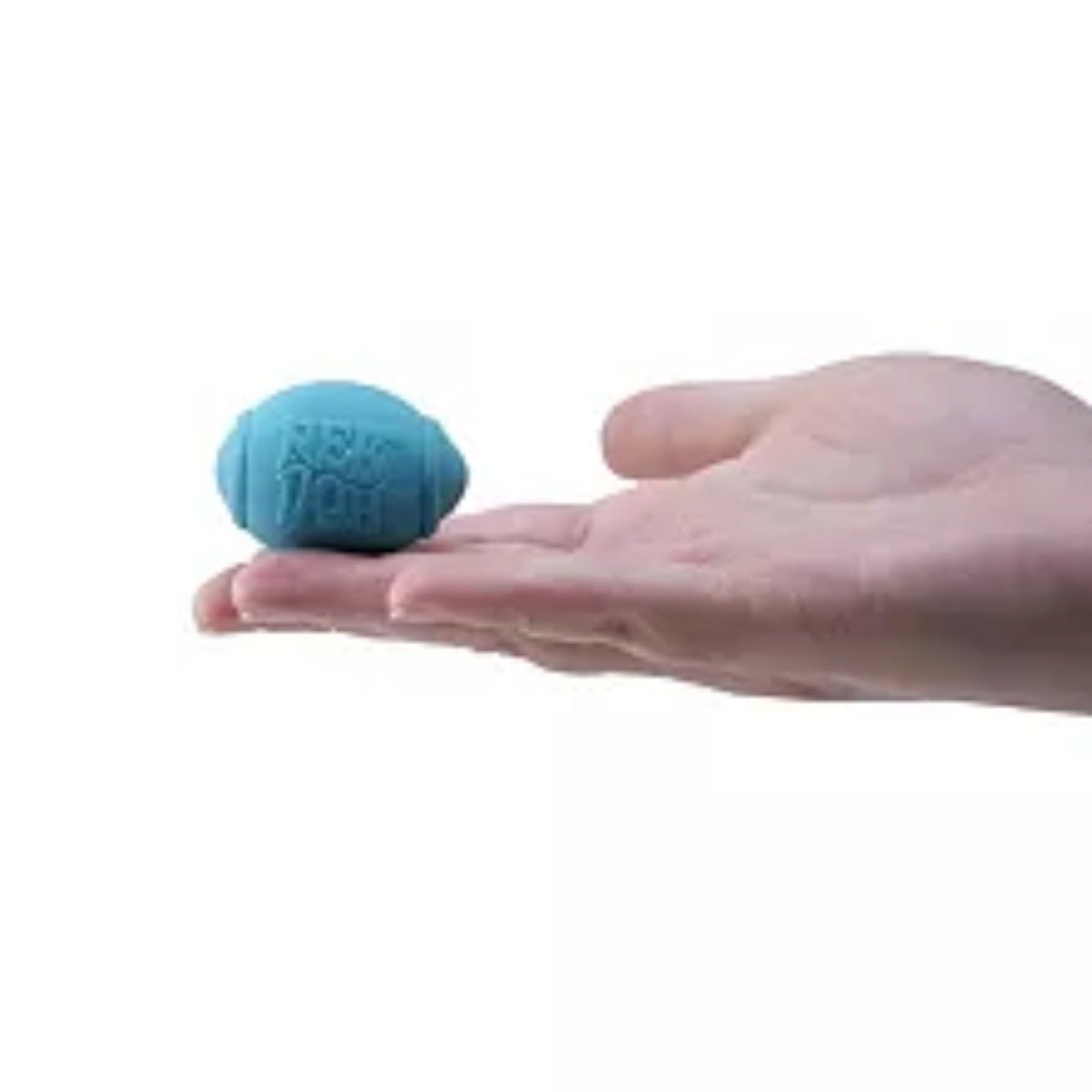 Teenie NeeDoh football squish ball in hand