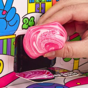 Hand squeezing an orange mini NeeDoh toy, 24 unique toys with a variety of squishing textures