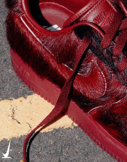 Nike Air Force 1 Low Team Red styled on foot