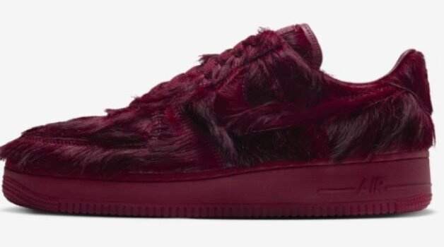 Nike Air Force 1 Low QS Team Red side profile with fuzzy red upper and red sole