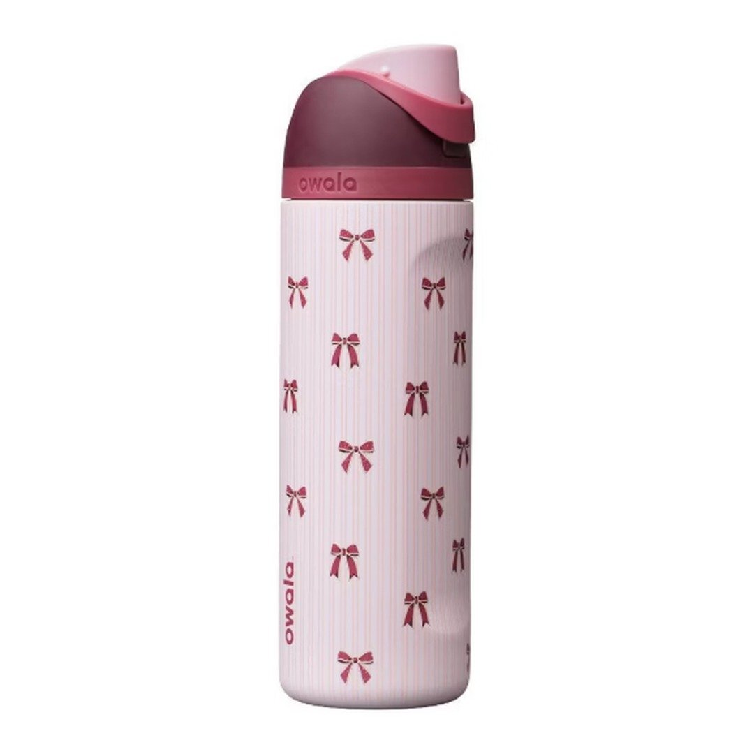 Owala FreeSip 24 oz Special Edition water bottle in Take a Bow with red bows