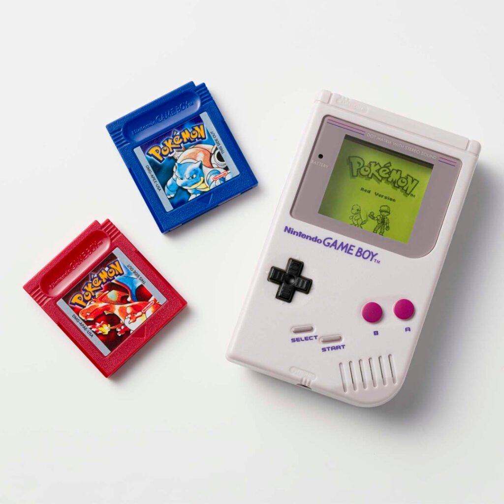 Game Boy-style jukebox player with red and blue Pokémon cartridges
