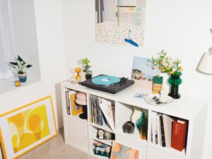 Sony PS-LX3BT turntable lifestyle on white shelf with blue vinyl