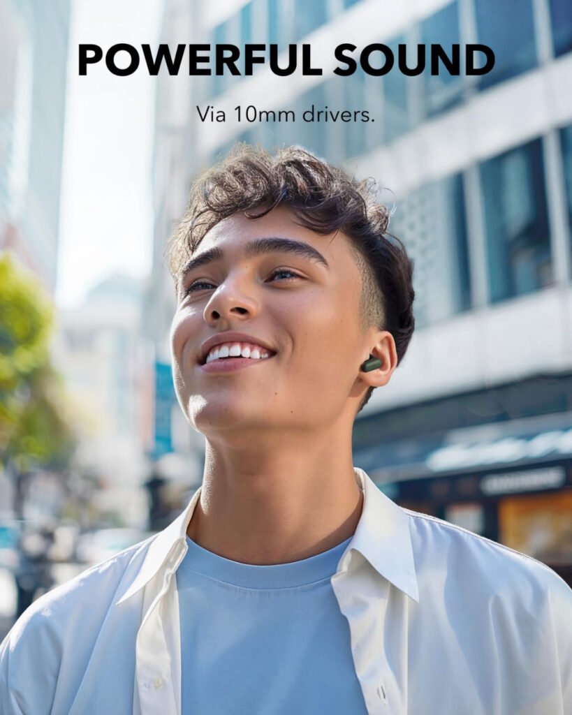 Man wearing Soundcore P30i earbuds with 10mm drivers outdoors