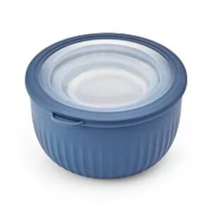 Close-up of a blue The Big One nesting bowl with lid